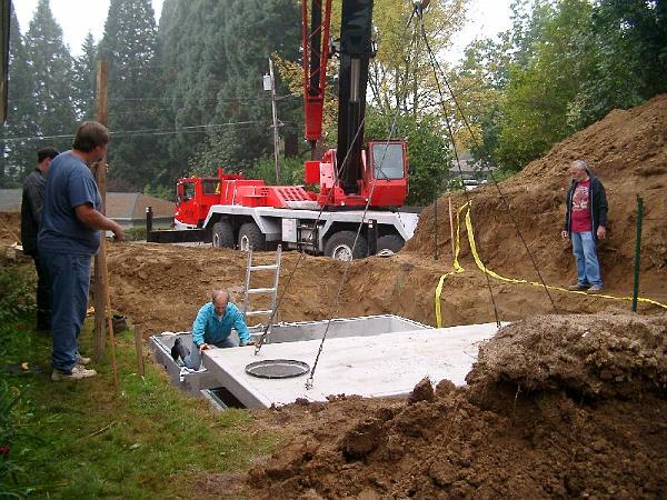 House 9.24.04 00046.JPG - The lid weighs 2 tons.